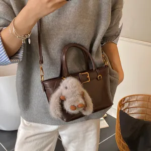 Borsa a mano retrò in pelle marrone stile coreano con ciondolo coniglietto donna.