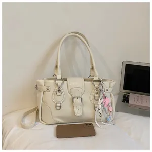 Casual retro PU leather shoulder bag with buckle details and charm, versatile tote style.
