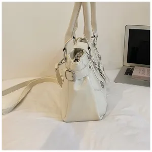White vintage PU leather handbag with shoulder strap and silver hardware stylish tote bag