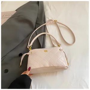 Stylish quilted underarm shoulder bag for women, premium PU leather handbag with chic strap.