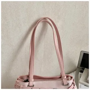 Pink shoulder bag for women, stylish large tote bag with double handles and zipper closure.