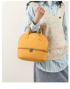 Detail view of the portable insulated lunch bag with double-layer design and handle.