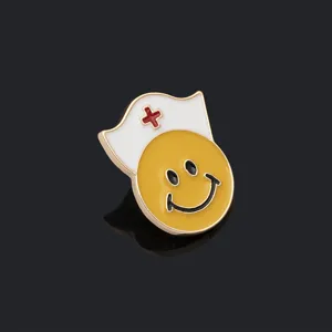 Close-up detail of the cute nurse smiley face enamel pin, medical theme alloy badge decor.