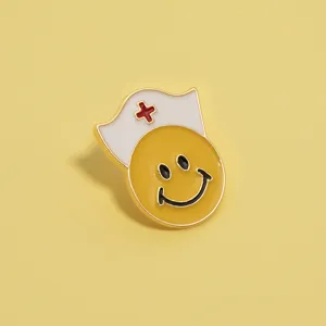 Close-up detail of the cute nurse smiley face metal brooch, perfect medical theme badge.