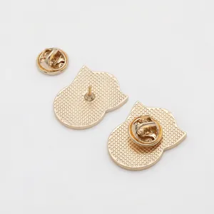 Gold metal alloy cartoon character enamel pin brooch back view showing secure butterfly clutch.