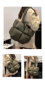 Dark green padded tote bag detail shot, quilted puffer shoulder handbag, casual soft travel purse.
