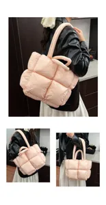 Detail view of the winter pink quilted padded tote bag, soft space cotton cloud bag style.