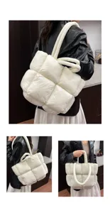 Detail view of the winter white padded puffer tote bag showing multiple carrying options.