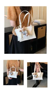 Stylish white leather tote bag for women, large capacity shoulder handbag with cute bear.