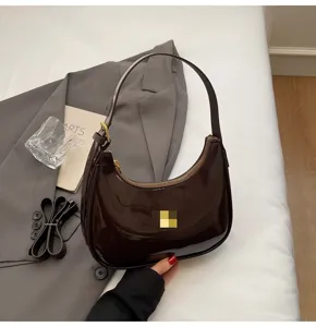 Dark brown patent leather shoulder bag, trendy minimalist baguette bag for women daily wear.