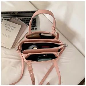 Stylish pink PU leather women shoulder bag with multi-compartments, perfect for daily commute.