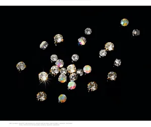 Sparkling hand-sewn glass rhinestones with metal claw settings for DIY crafts and dresses.