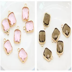 Rectangle faceted crystal pendants with gold bezel settings for DIY jewelry making crafts.