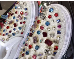 Sparkling rhinestone canvas slip-on shoes featuring colorful crystal diamond accents.