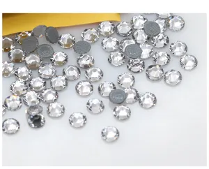 Clear flatback rhinestones detail shot, perfect for DIY crafts, nail art, and garments.