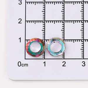 Close-up detail of 10mm colorful crystal rhinestone hollow round DIY jewelry accessories.