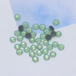 Light green opal glass rhinestones flatback crystals for DIY wedding dress clothing decoration.