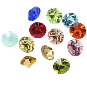 Colorful pointed-back round glass rhinestones for DIY nail art and phone case decoration.