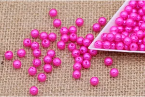 Hot pink ABS plastic imitation pearl loose beads detail shot, 4-8mm round craft beads.