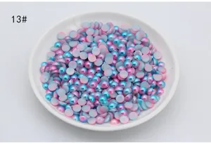 Detailed view of colorful gradient mermaid flatback pearl beads for cute phone case nail art.