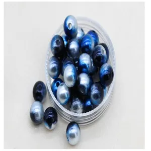 Perline di perle finte sfumate in ABS vista dettagliata per nail art e decorazioni.
