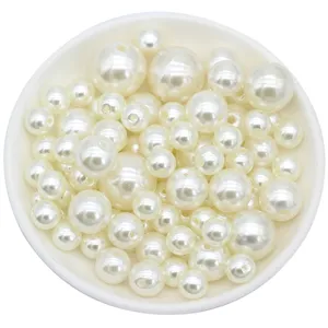 White ABS plastic imitation pearls loose beads for garment accessories and crafts.