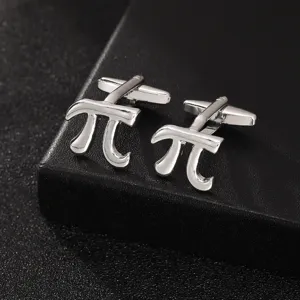 Close-up of silver mathematical Pi symbol cufflinks detail, elegant men's business accessory