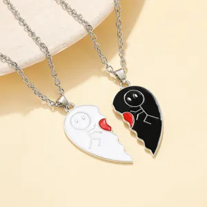Couple matching broken heart pendant necklace with cute stick figure design for lovers and friends.