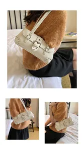 Bolso de hombro blanco de moda para mujer con hebilla de metal y tachuelas elegantes.