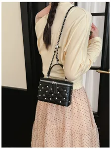 Black quilted chain box bag detail, elegant studded shoulder cross body handbag for women