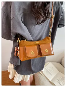 Sac à bandoulière tendance multi-poches pour femme, élégant sac à main en cuir PU.