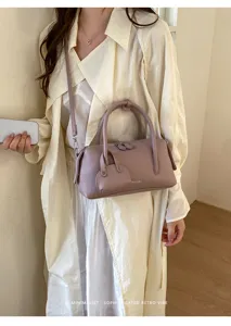 Stylish litchi grain boston handbag for women, trendy shoulder crossbody bowler bag details.