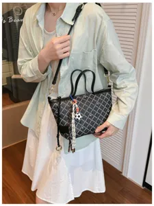 Sac seau vintage pour femme, élégant sac à bandoulière chic avec beau motif.