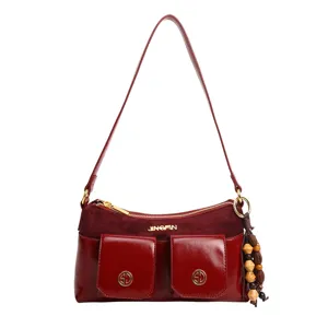 Sac a epaule sous les bras rouge a poches multiples pour femmes, sac bandouliere chic.