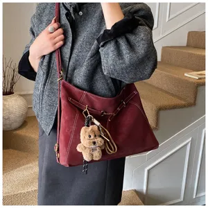 Retro matte multi-function shoulder tote bag detail, large capacity casual design for women.