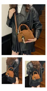Retro soft leather bowling bag, versatile top handle crossbody bag for women's daily fashion.
