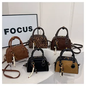 Vintage soft leather bowling bag trendy versatile crossbody shoulder bag with charm details