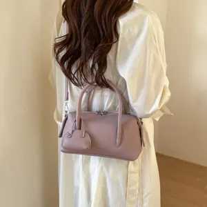 Stylish litchi pattern Boston handbag for women, trendy shoulder and crossbody bag.