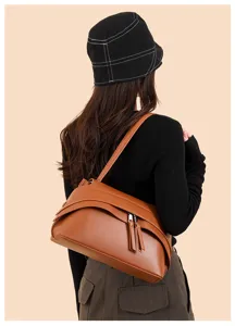 Vintage brown leather underarm shoulder bag for women, trendy chic retro crossbody tote.