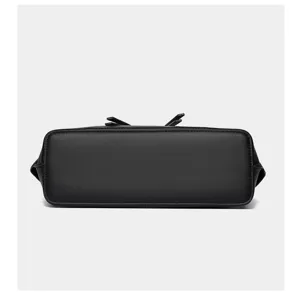 Black women underarm bag bottom detail view, premium pu leather retro handbag close up.