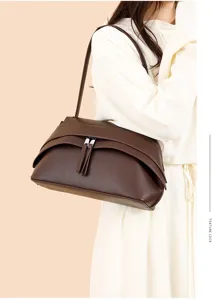 Stylish brown leather underarm shoulder bag for women, retro chic design with zipper.