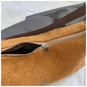 Vintage textured pleated baguette shoulder bag for women, stylish daily casual chic underarm purse.