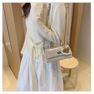 Chique minimalistische schoudertas voor dames, trendy crossbody tas met leuk schommelpaard.