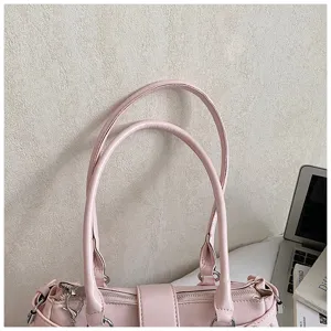 Chic pink PU leather shoulder handbag detail view, stylish commuter tote bag for modern women.