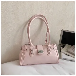 Chic pink PU leather shoulder underarm bag with metal twist lock and stylish riveted details for women.