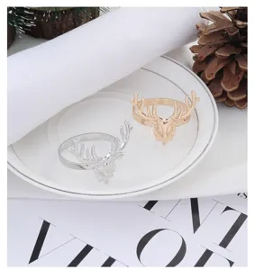 Detailed view of exquisite alloy elk napkin rings, perfect for Christmas table decor and hotel settings.