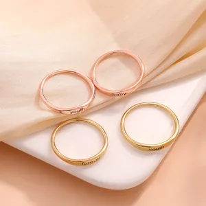 Minimalist copper rings set with engraved English letters for daily stylish fashion wear.
