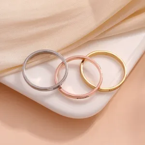 Minimalist copper stacking rings set with engraved English words in three colors for women.