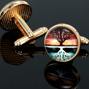Tree of life glass dome cufflinks, polished gold tone metal cuff links detail view.