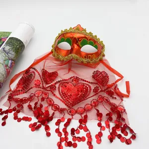 Red masquerade mask with glitter gold trim and sequin mesh veil for party dress up detail.